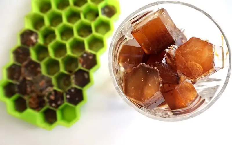 Coffee iced cubes in a glass