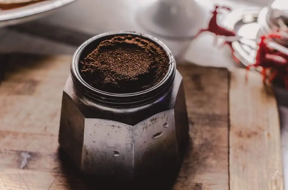 Moka pot filled with coffee grounds