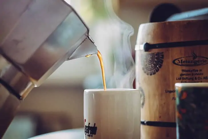 Pouring coffee from a moka pot