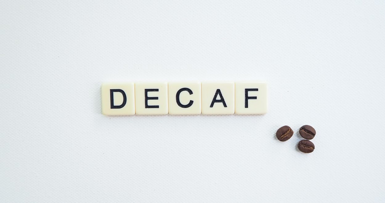 White tiles spelling out decaf.