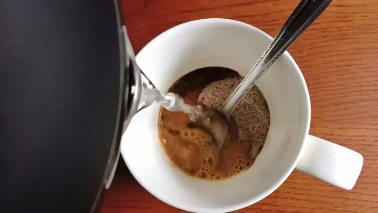 Instant coffee pouring hot water