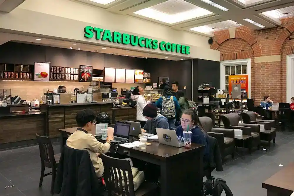 Students studying inside a Starbucks coffee